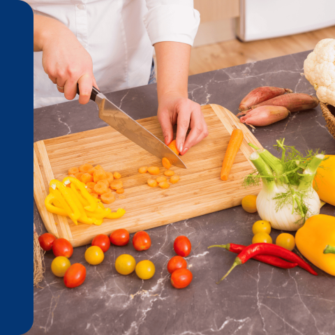 A person chopping vegetables.